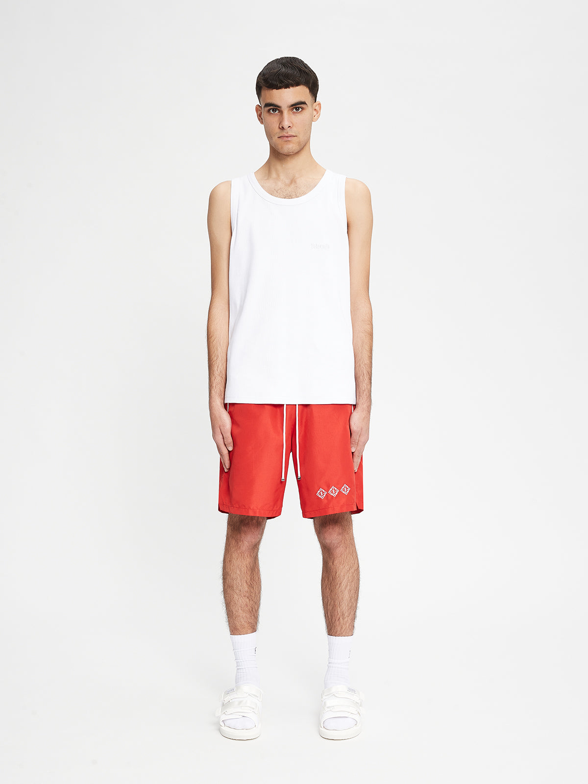 SWIM SHORTS SYMBOL - LAVA RED